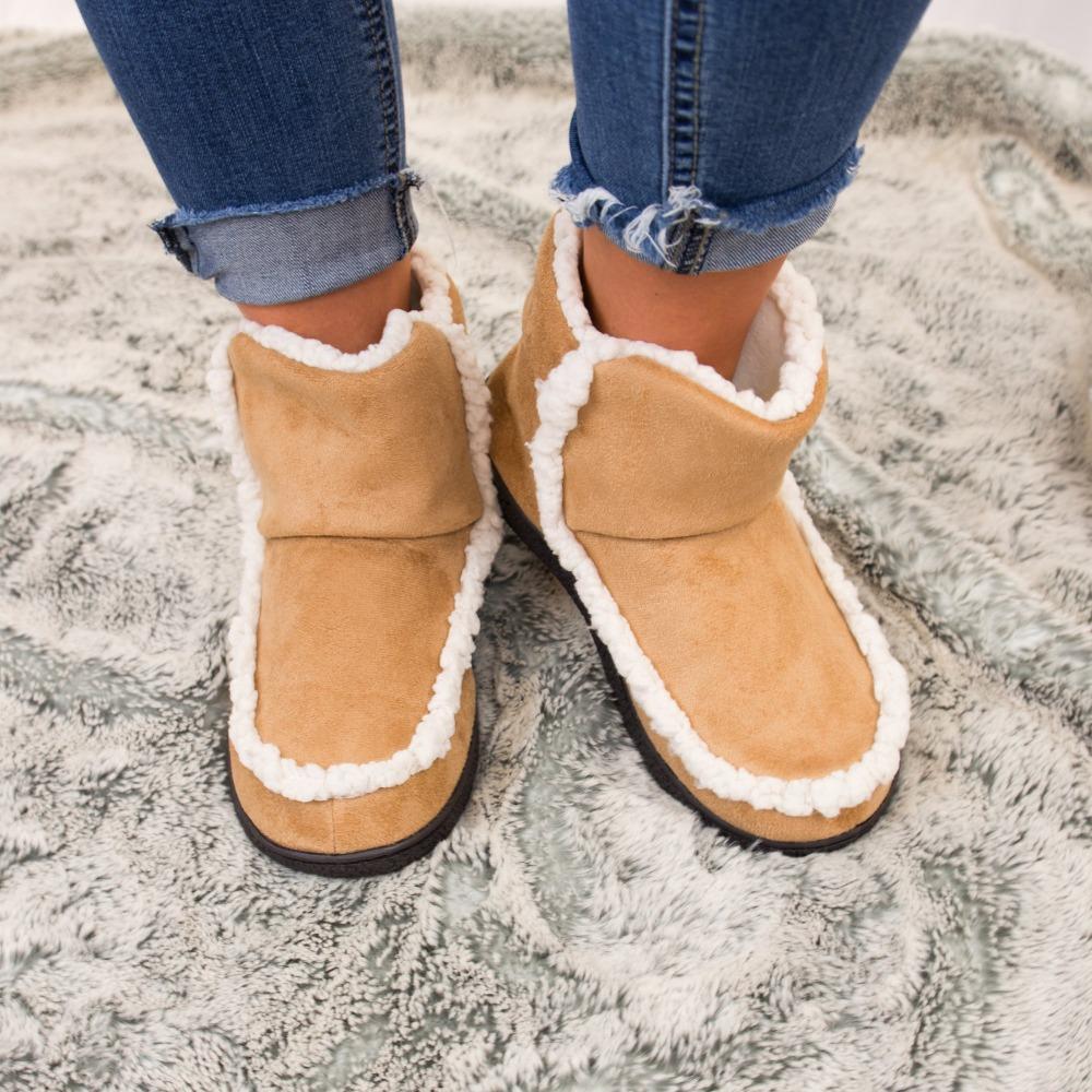 Women's Microsuede Alex Boot Slippers in Buckskin on model standing on fur rug