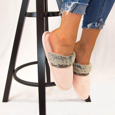 Women's Zulu Clog Slippers in Evening Sands (Pink) on Model sitting on stool