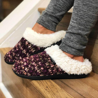 Women's Sweater Knit Amanda Hoodback Slippers in Henna (Maroon) on Model sitting on the stairs