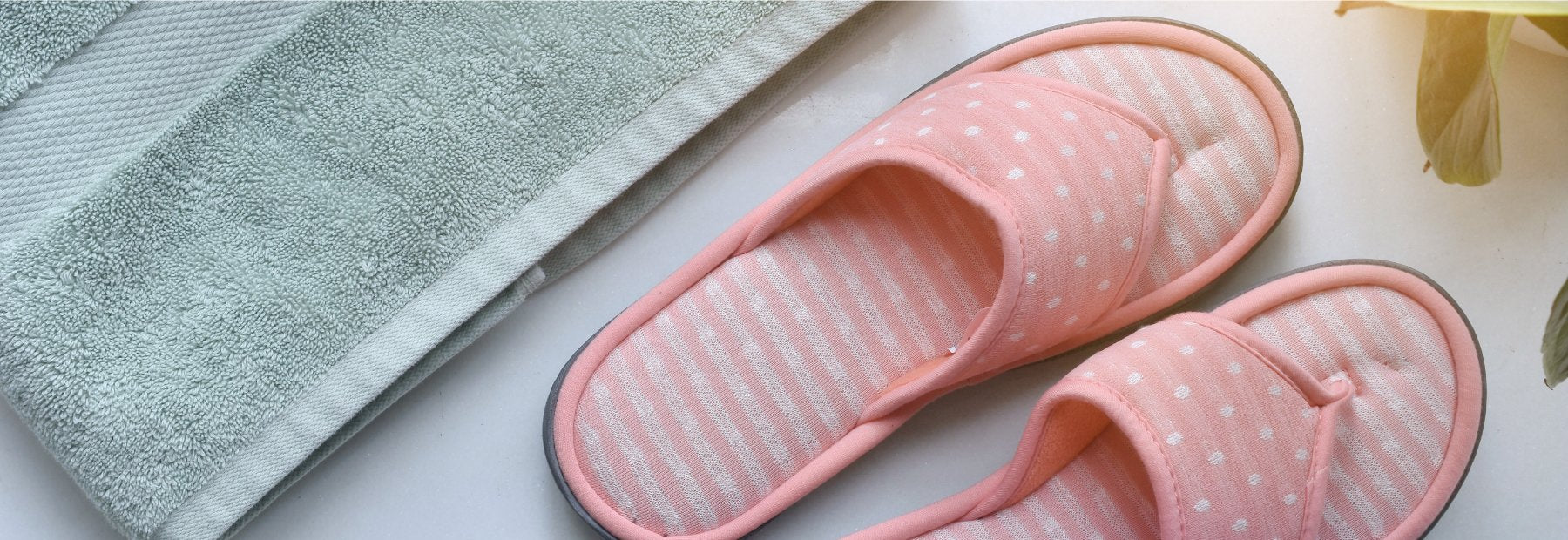 Women's Jersey Dot Ada Thong Slipper off figure laying next to towel