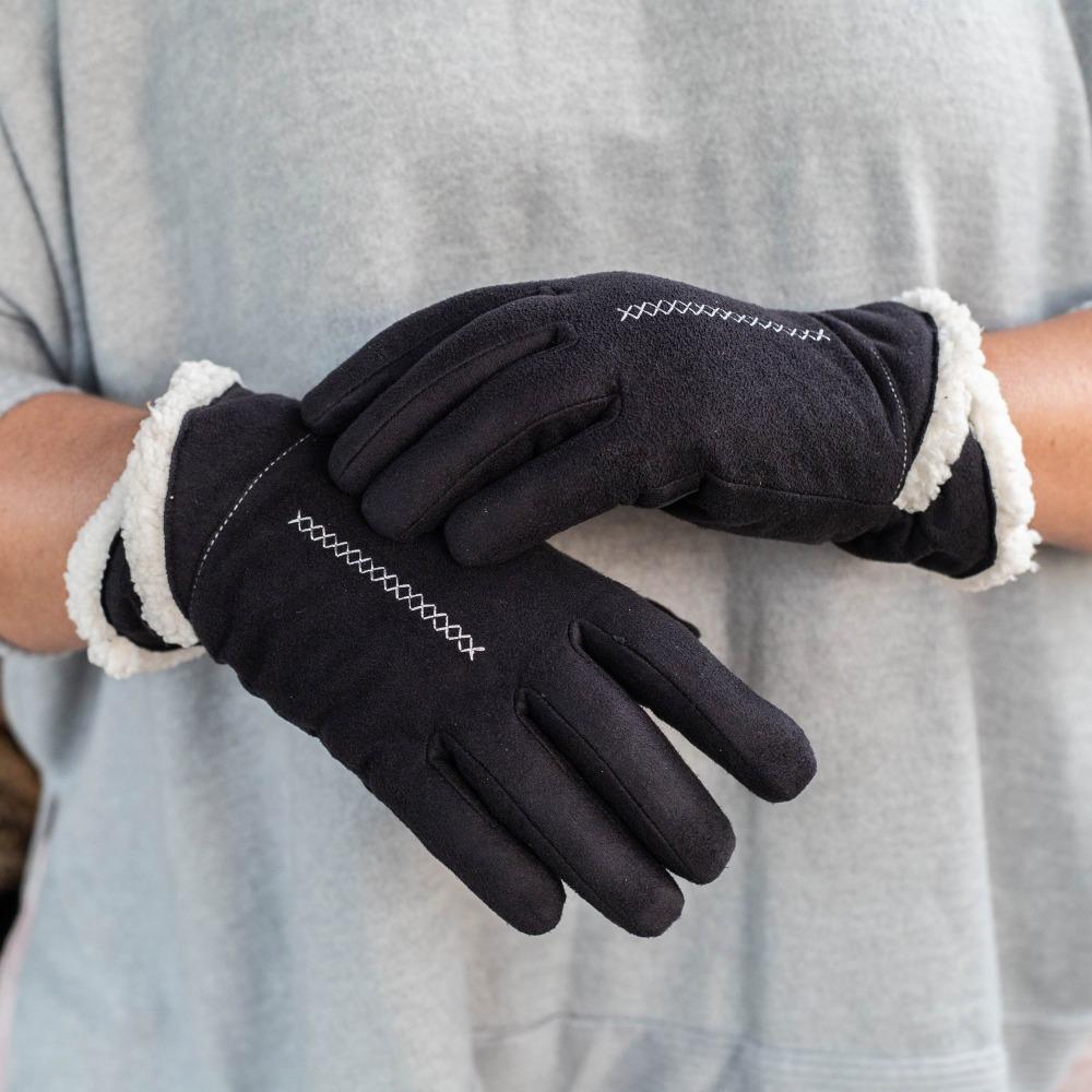 Women's Recycled Microsuede Gloves with Overlap Wrist in Black on figure. Model pulling gloves on in front of her chest