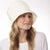 Women's Lined Recycled Fleece Water Repellent Cloche Hat on figure. Model wearing hat