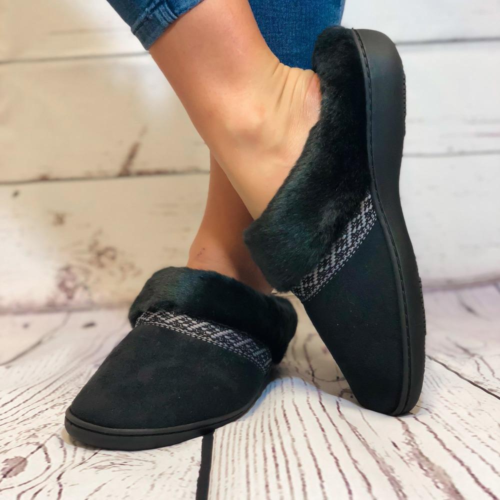 Women's Microsuede Basil Hoodback Slippers in Black on Model standing on hardwood floor