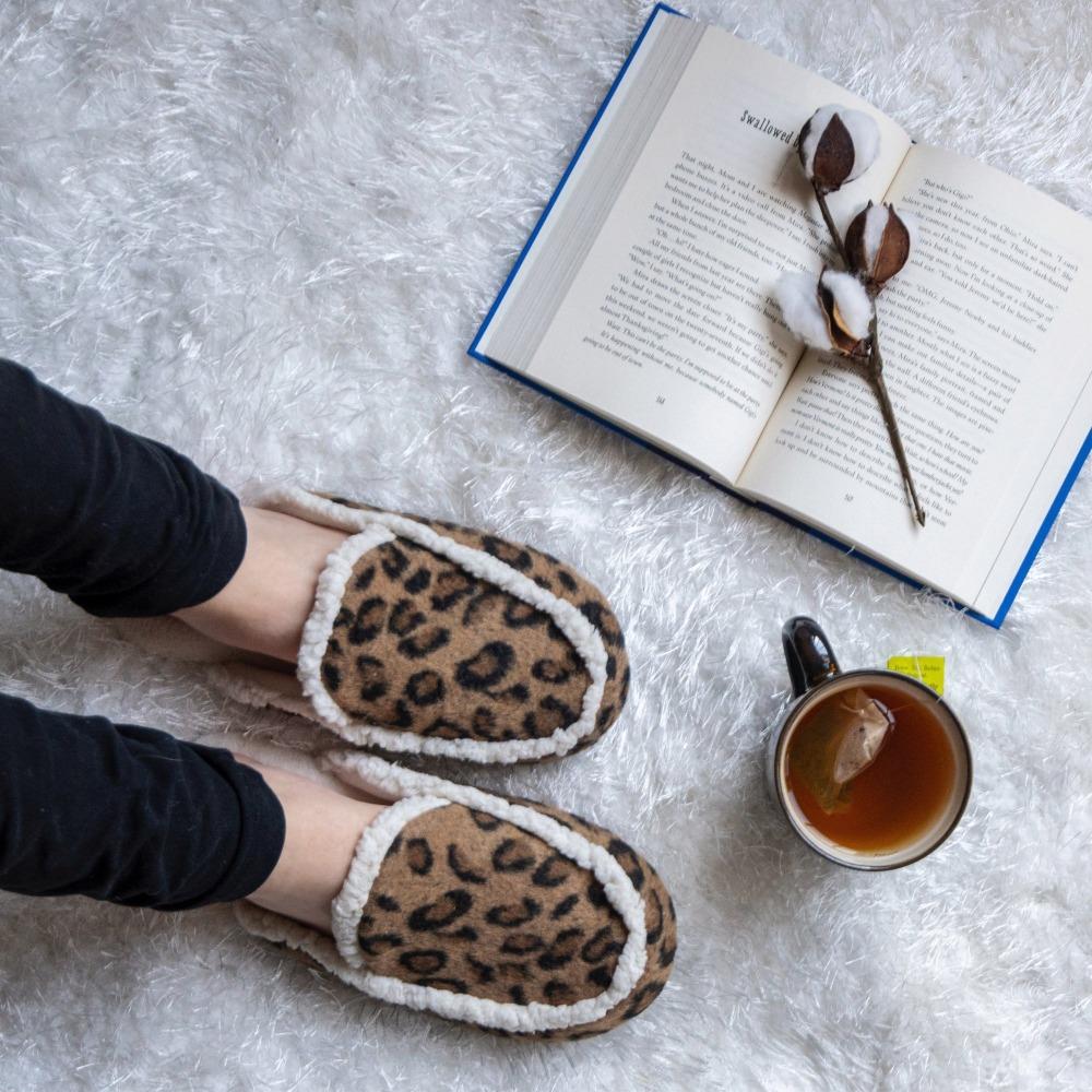 Women's Microsuede Alex Scuff Slippers in Buckskin (Cheetah Print) On Model Chilling with tea and a book