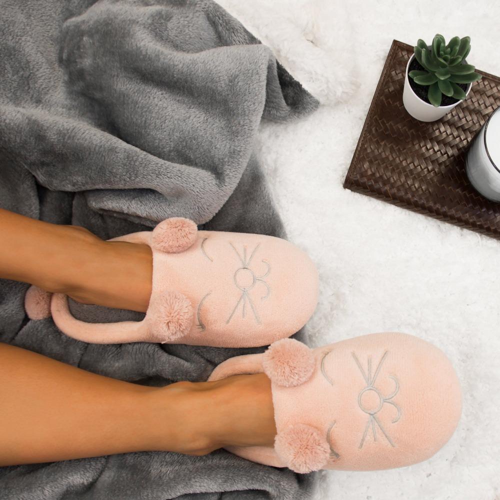 Women's Microterry Critter Hoodback Slippers in Evening Sands on Model amongst blankets