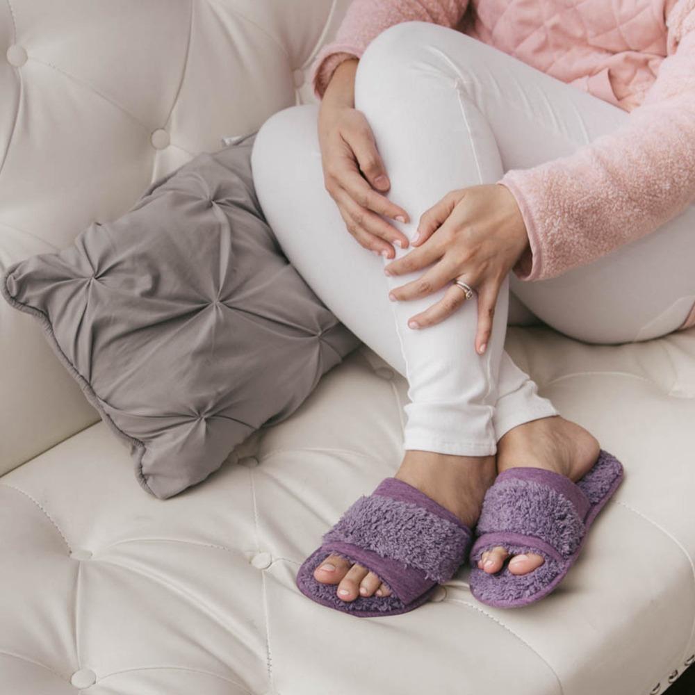 Women's Linley Jersey and Chenille Slide Slippers in Iris on Model sitting on a couch