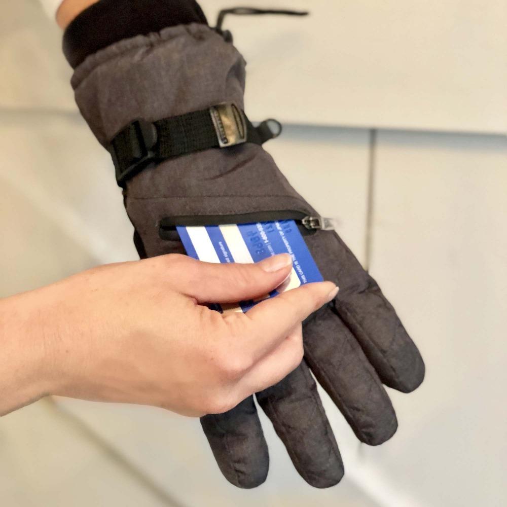 Women's Ski Gloves in Black Model Showing Pocket use