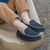 Boy's Chandler Moccasin Slippers Black on Model