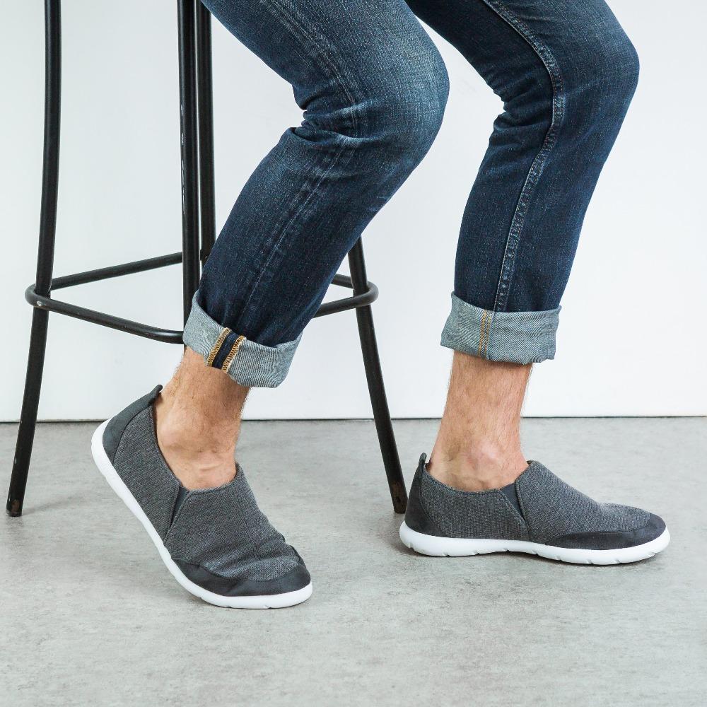 Zenz Men's Activate Slip-On in Mineral on model sitting on a stool